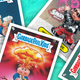 A scattering of Garbage Pail Kids cards, still every bit as gleefully gross as you remember.